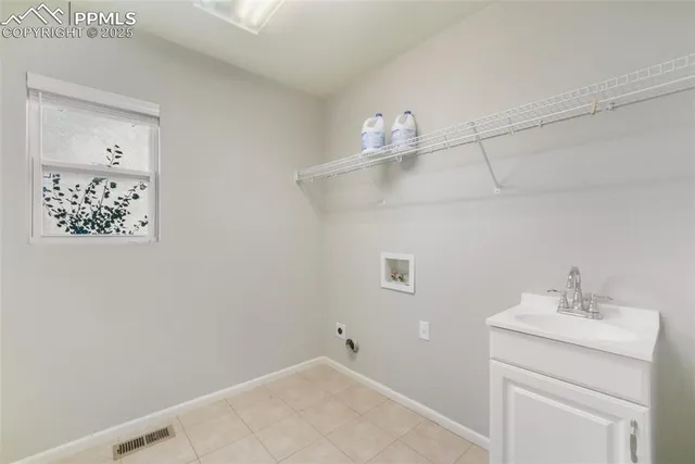 a bathroom with a sink and vanity