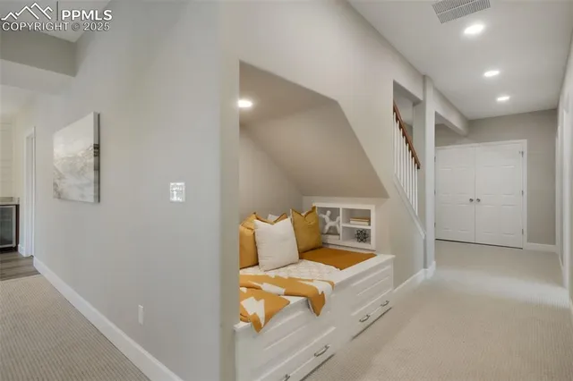 a living room with furniture and a table