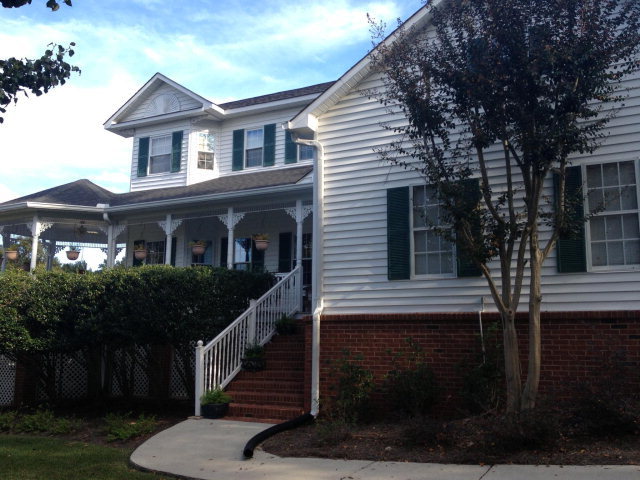 160 Gates Road Lizella, GA 31052 - Photo 2 of 2 a front view of a house with a yard