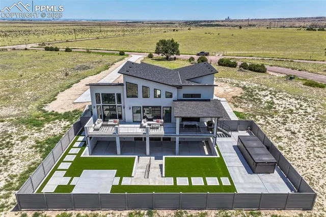 a view of a swimming pool with an ocean view