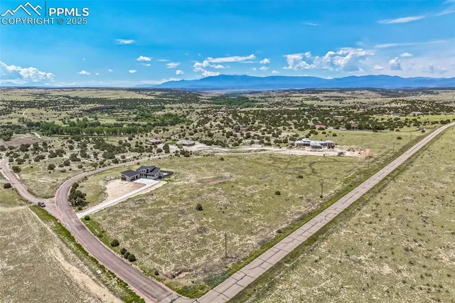 a view of a house with a street