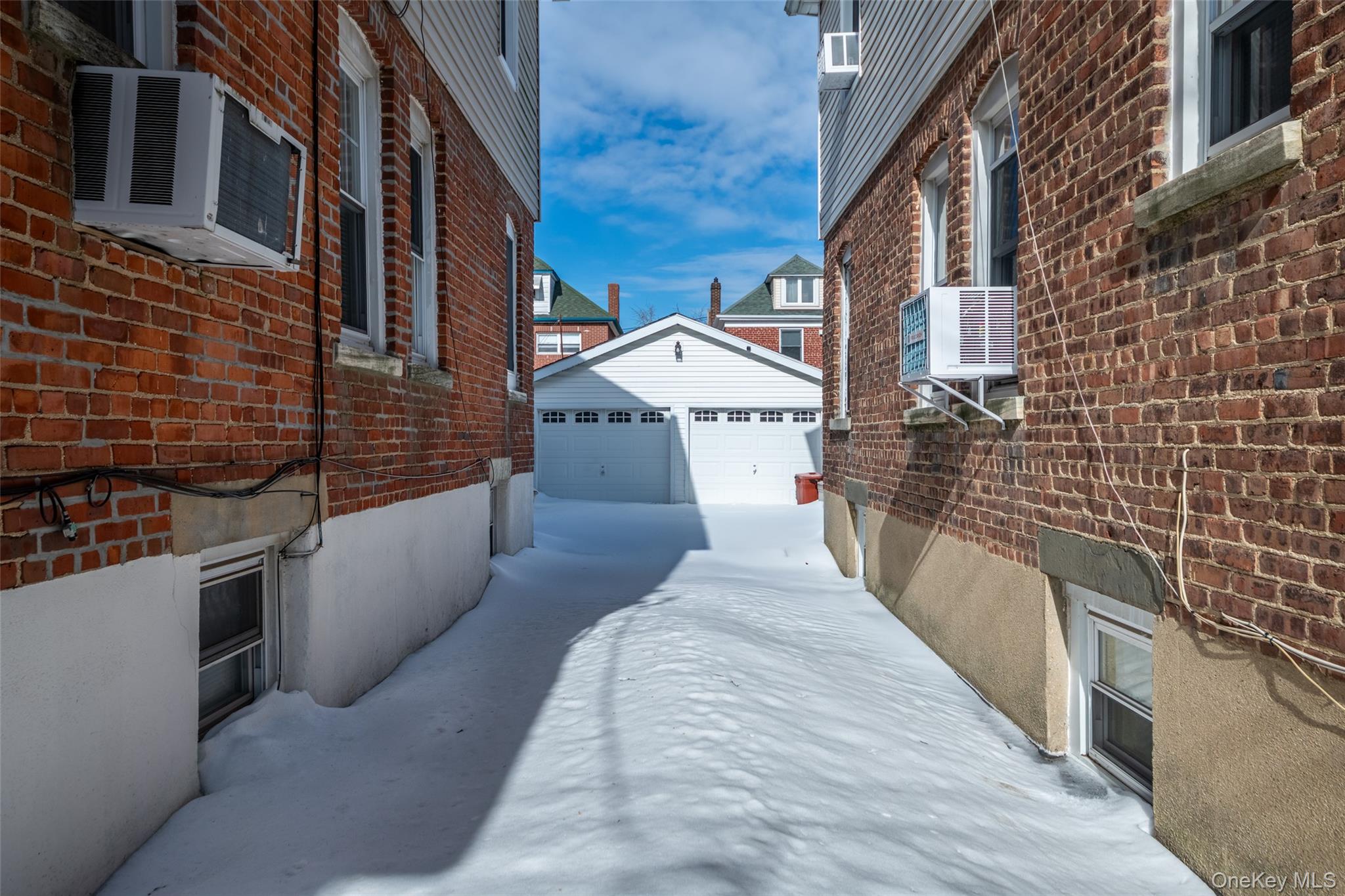 91 Winters Street Bronx, NY 10464 - Photo 24 of 28 with the driveway
