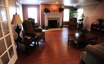 4506 Chapel Ridge Lane Other, IA 51501 - Photo 9 of 11 a living room with furniture and a fireplace