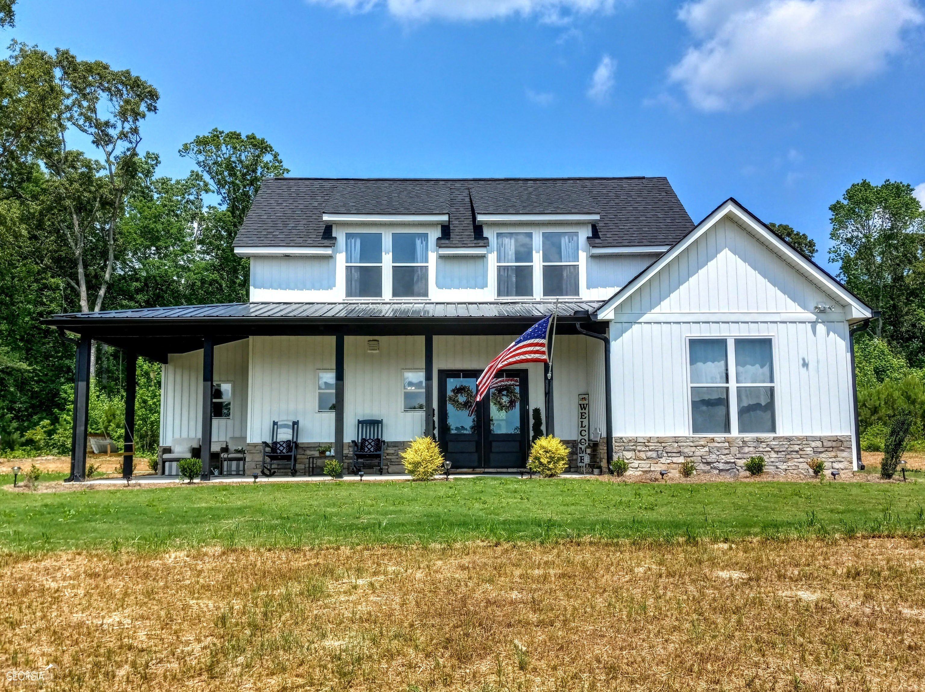 533 Lively Road Waco, GA 30182 - Photo 1 of 1 a front view of a house with a yard
