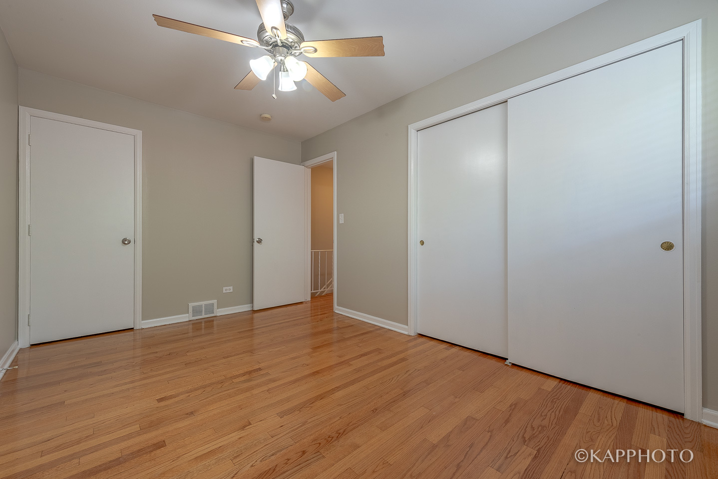 1406 Shermer Road, Unit 1406 Northbrook, IL 60062 - Photo 18 of 28 a view of an empty room with wooden floor