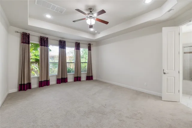 a large kitchen with stainless steel appliances granite countertop a sink and cabinets