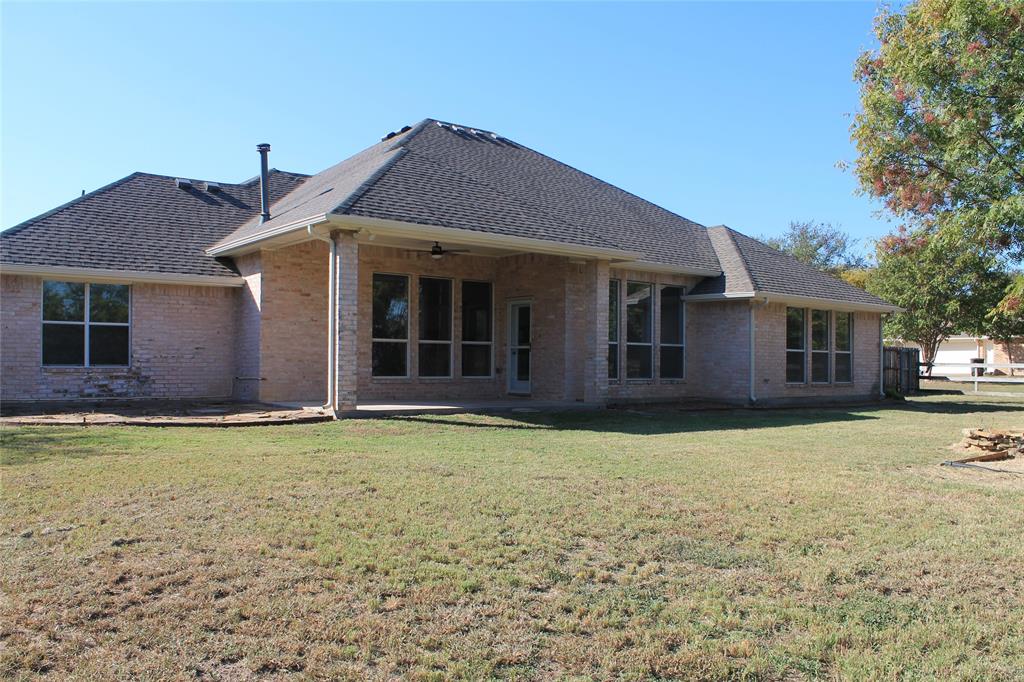 3051 Plainview Road Midlothian, TX 76065 - Photo 2 of 19 Back of house with large yard