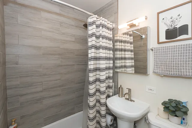 a bathroom with a sink and a toilet