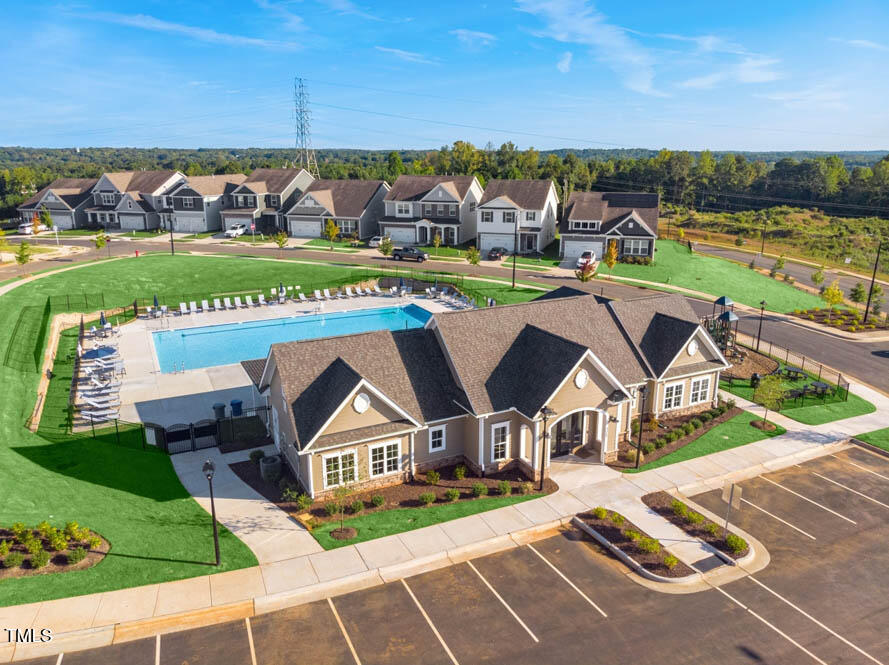 817 James J Freeland Memorial Drive Hillsborough, NC 27278 - Photo 23 of 33 an aerial view of a house with a garden and swimming pool