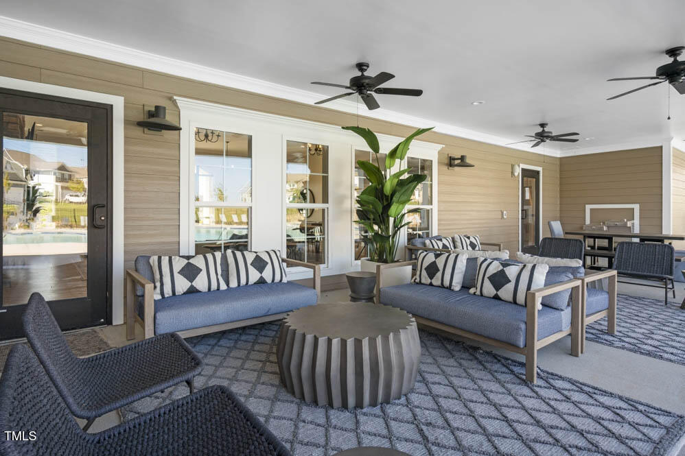 817 James J Freeland Memorial Drive Hillsborough, NC 27278 - Photo 30 of 33 a living room with furniture and a large window