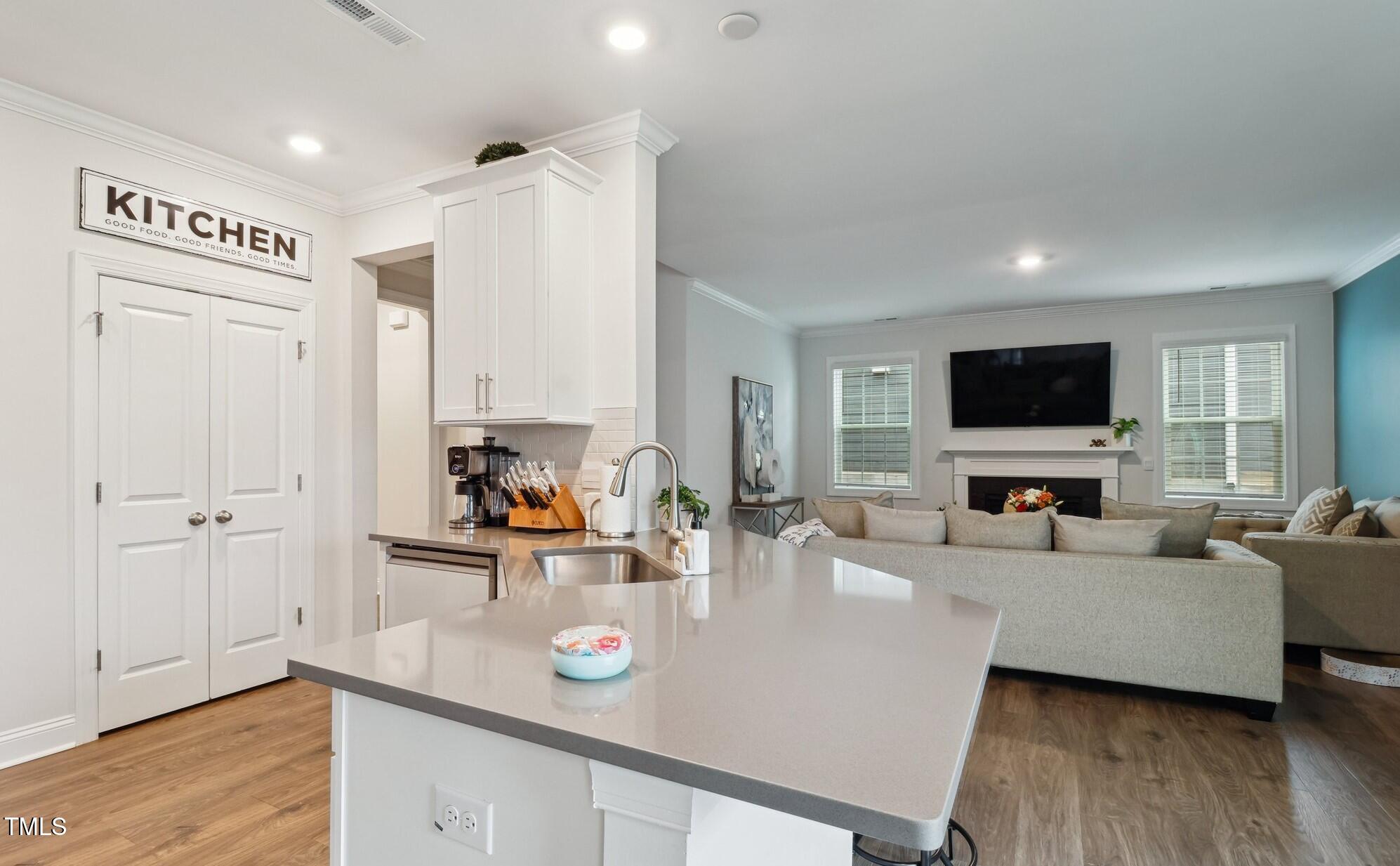 817 James J Freeland Memorial Drive Hillsborough, NC 27278 - Photo 5 of 33 a living room with furniture and a flat screen tv