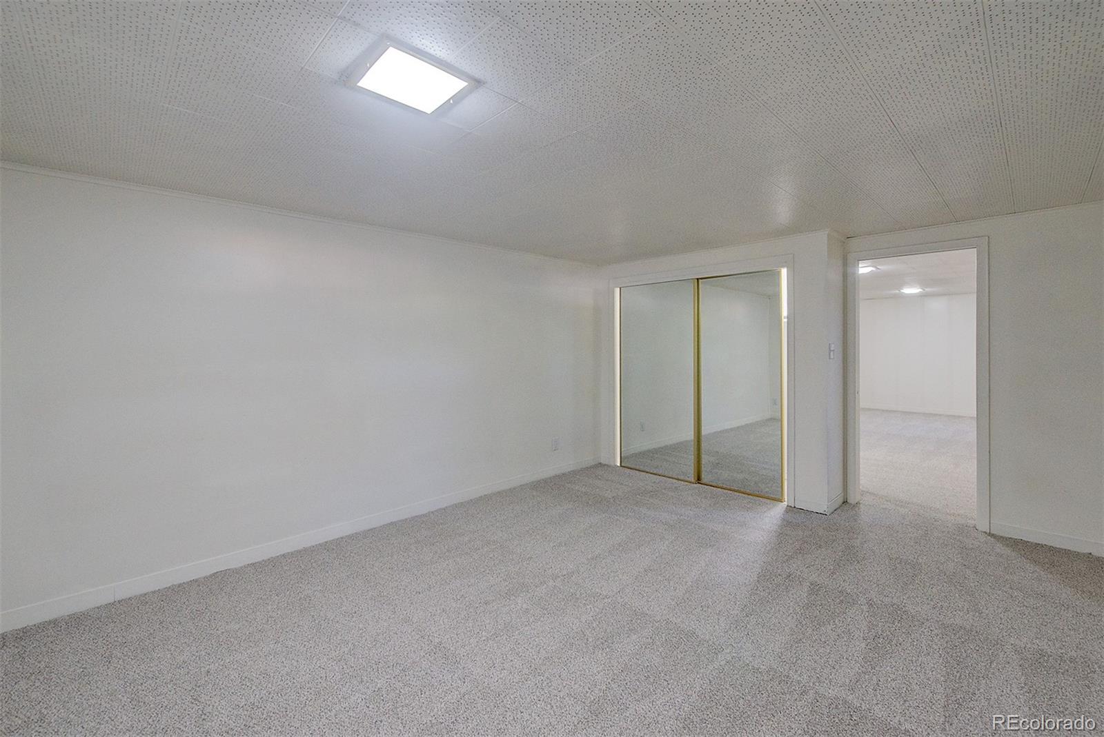 6054 Iris Way Arvada, CO 80004 - Photo 29 of 44 a view of an empty room