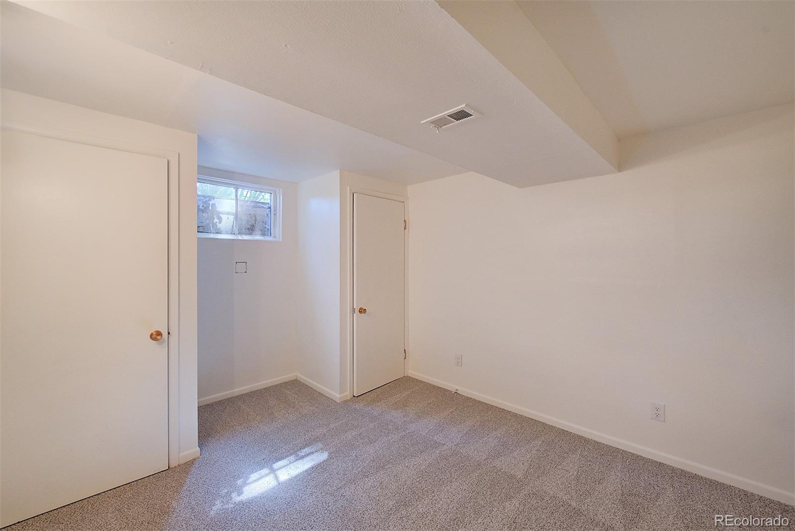 6054 Iris Way Arvada, CO 80004 - Photo 33 of 44 a view of an empty room