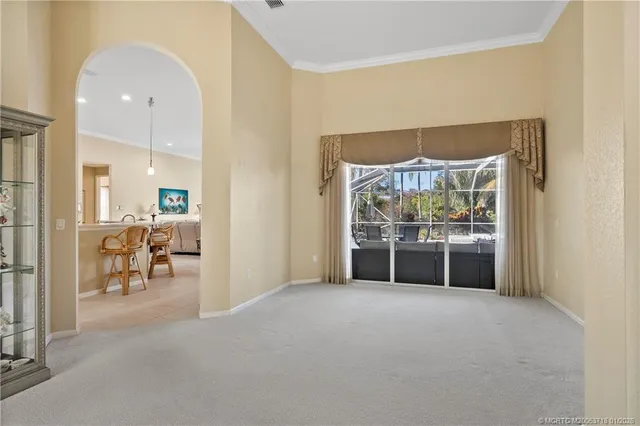a spacious bathroom with a double vanity sink a mirror and a shower