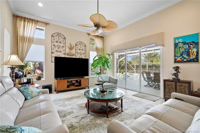 a view of yard with swimming pool and green space