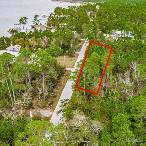 a view of a garden from a balcony