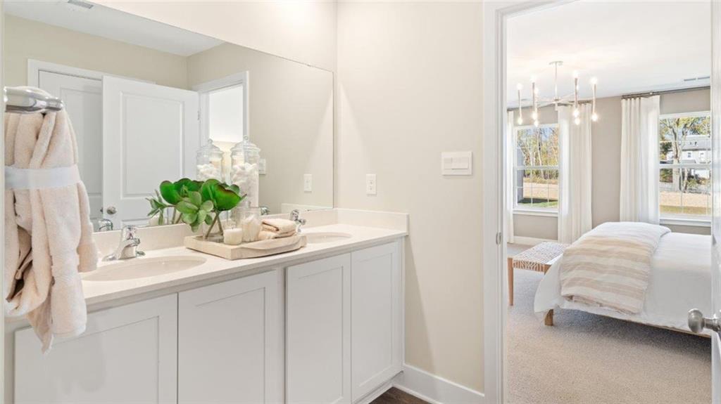100 Crabapple Lane Beaver Falls, PA 15010 - Photo 23 of 28 a en suite bathroom with a double sink and mirror