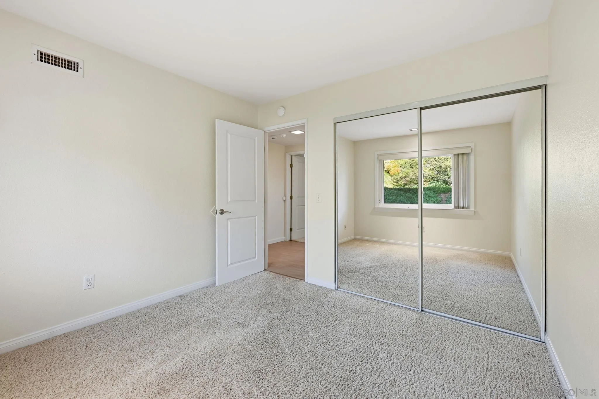 17570 Montero Road San Diego, CA 92128 - Photo 24 of 40 an empty room with a glass door shower