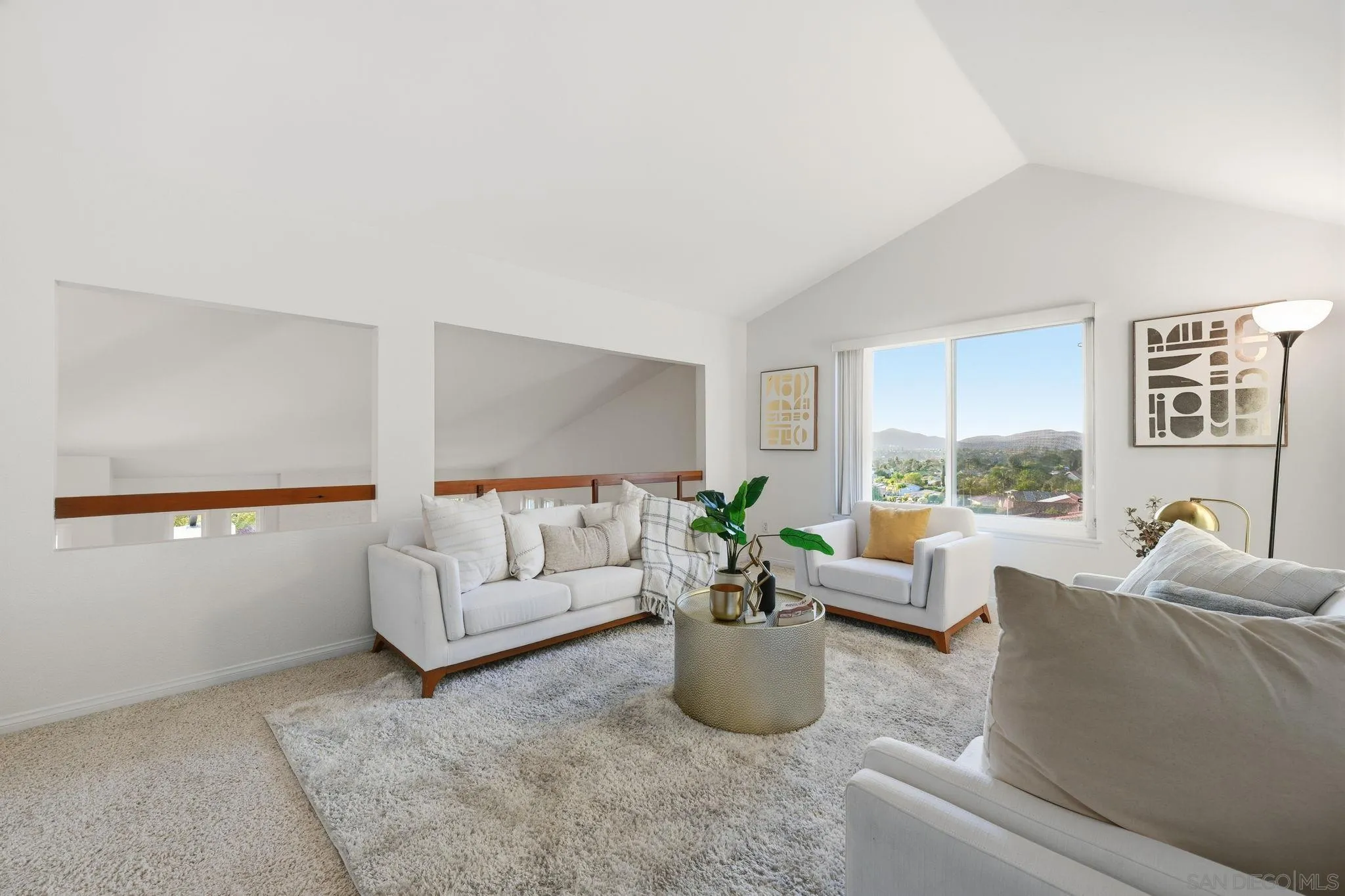 17570 Montero Road San Diego, CA 92128 - Photo 29 of 40 a living room with furniture and a large window