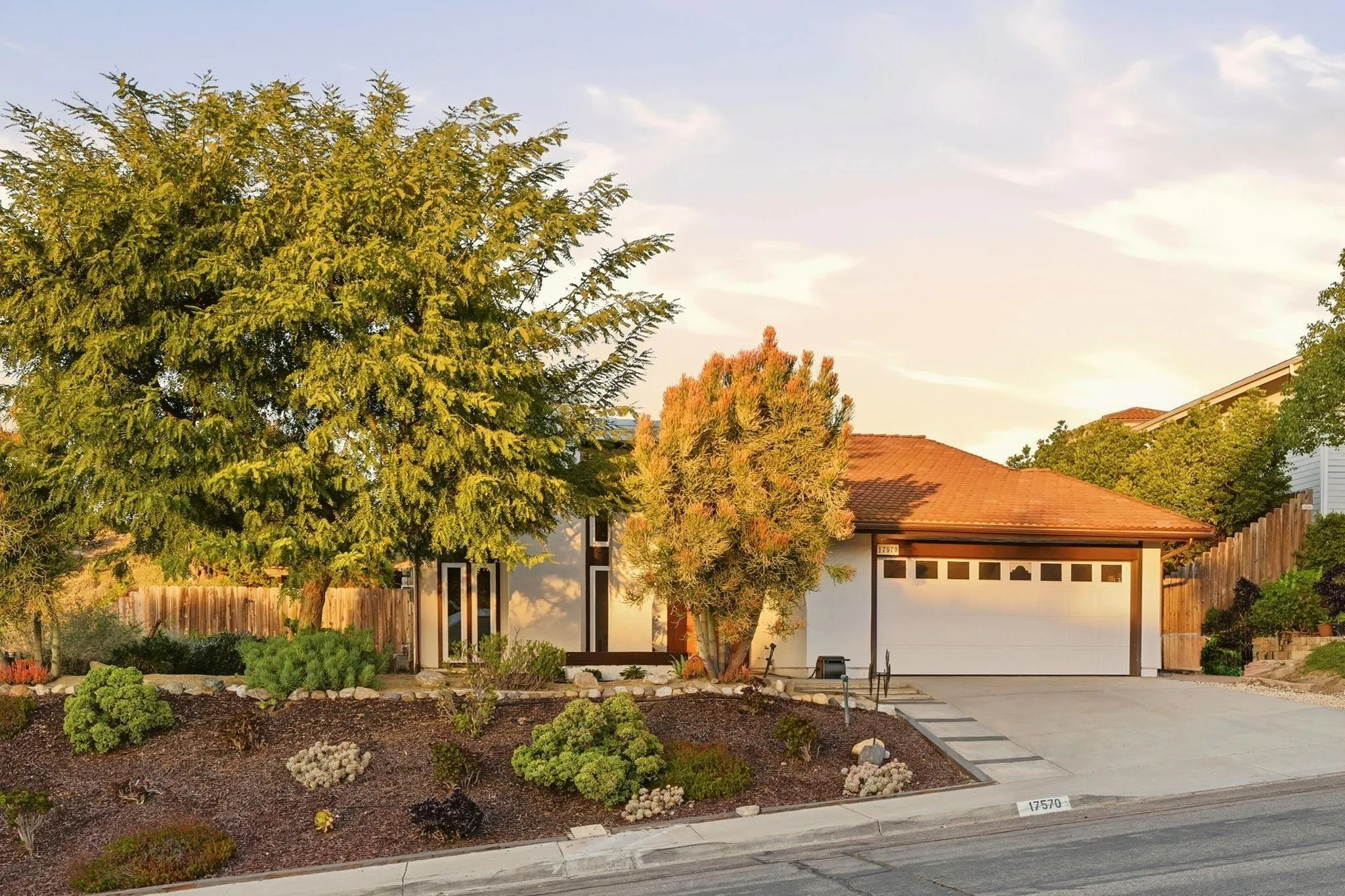 17570 Montero Road San Diego, CA 92128 - Photo 40 of 40 a front view of a house with a yard