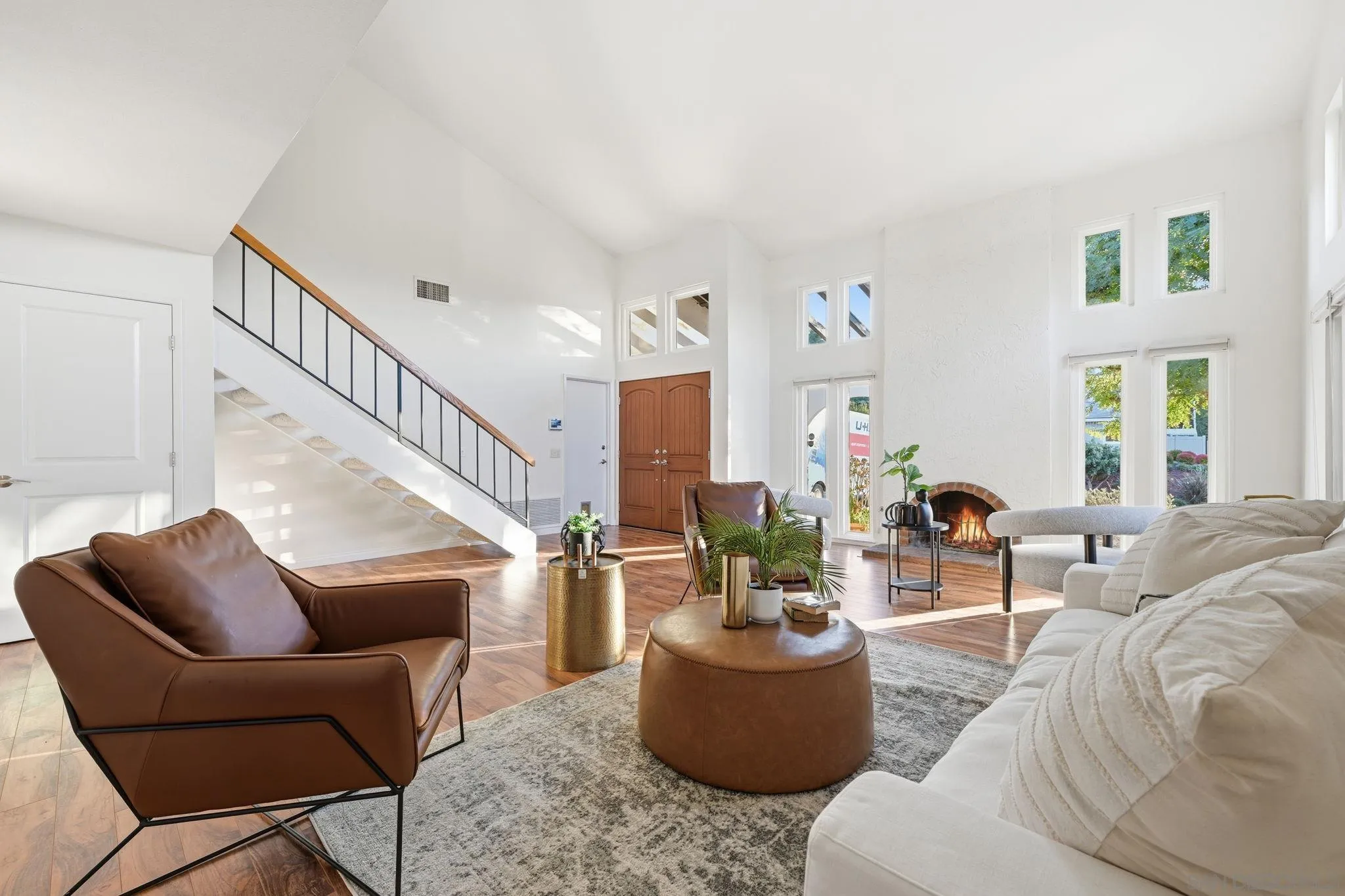 17570 Montero Road San Diego, CA 92128 - Photo 4 of 40 a living room with furniture and a potted plant