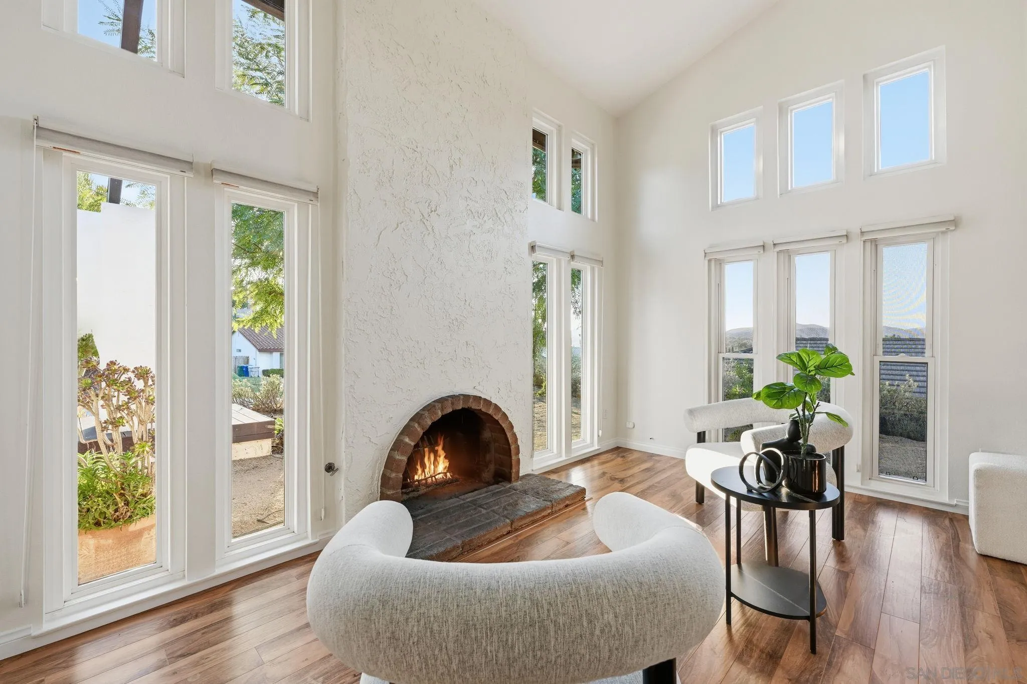 17570 Montero Road San Diego, CA 92128 - Photo 7 of 40 a living room with furniture and a window