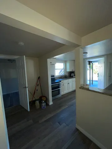 a view of a living room and dining room
