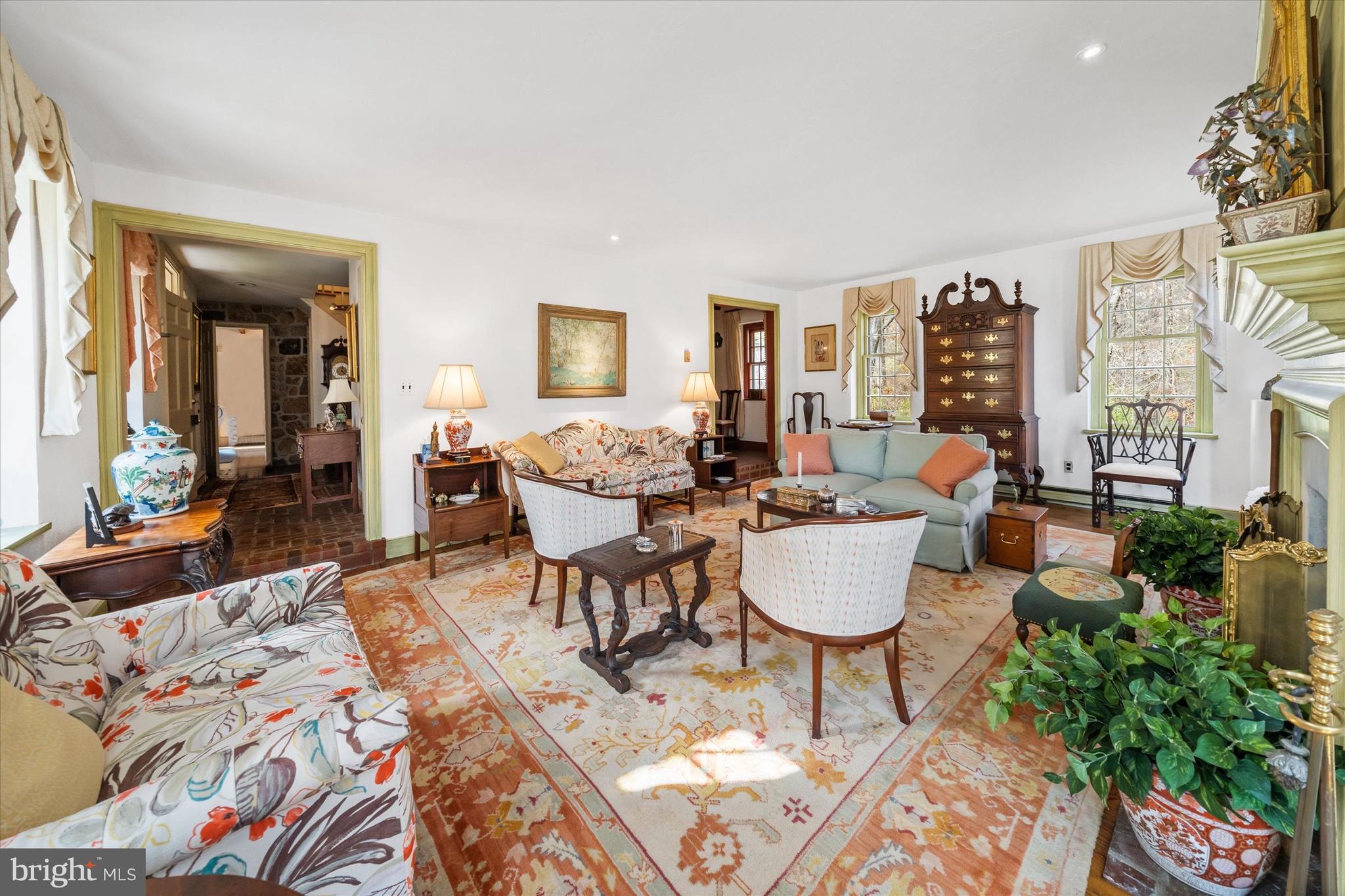 975 Brintons Bridge Road West Chester, PA 19382 - Photo 13 of 80 a living room with furniture and a table