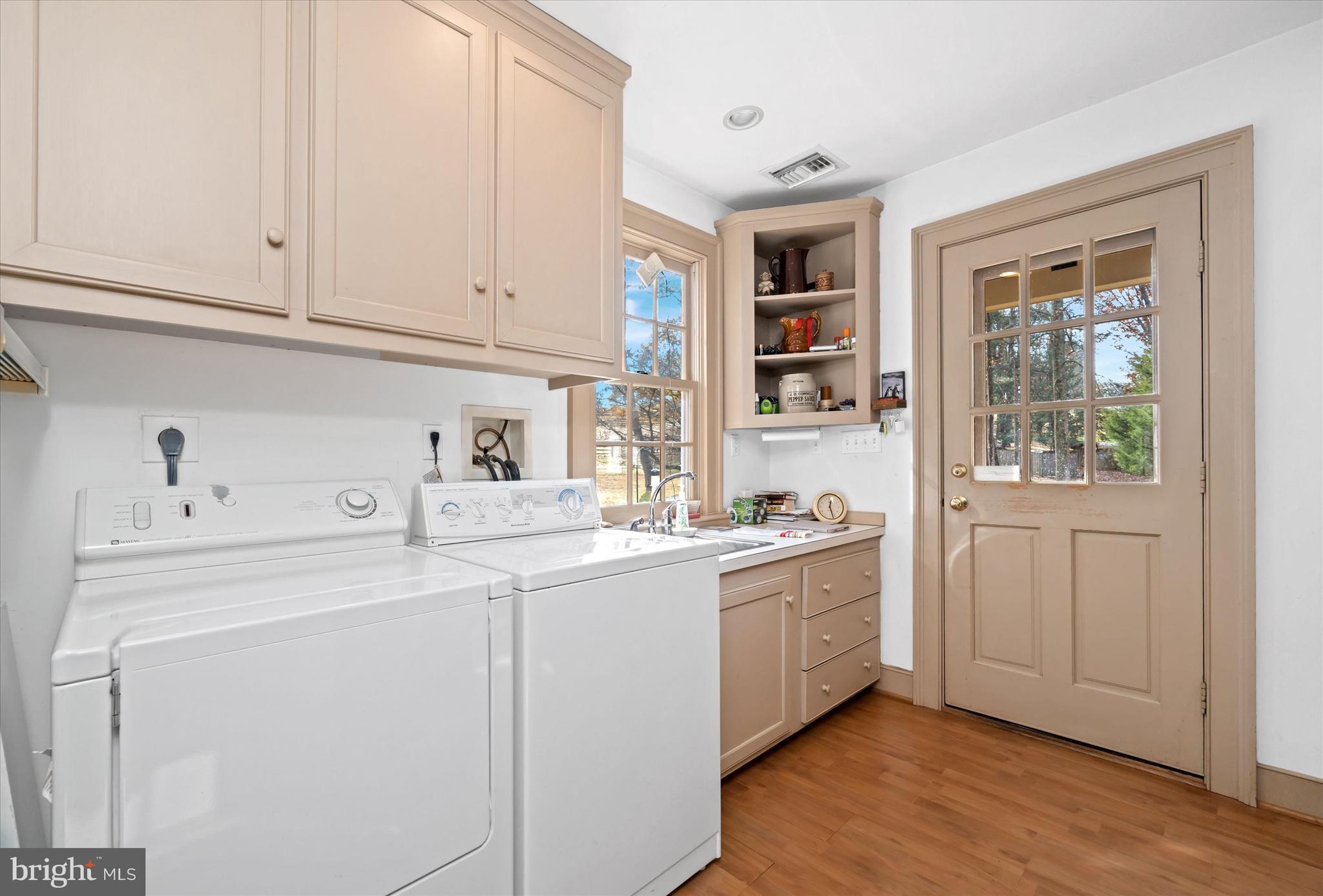 975 Brintons Bridge Road West Chester, PA 19382 - Photo 27 of 80 a kitchen with sink and cabinets