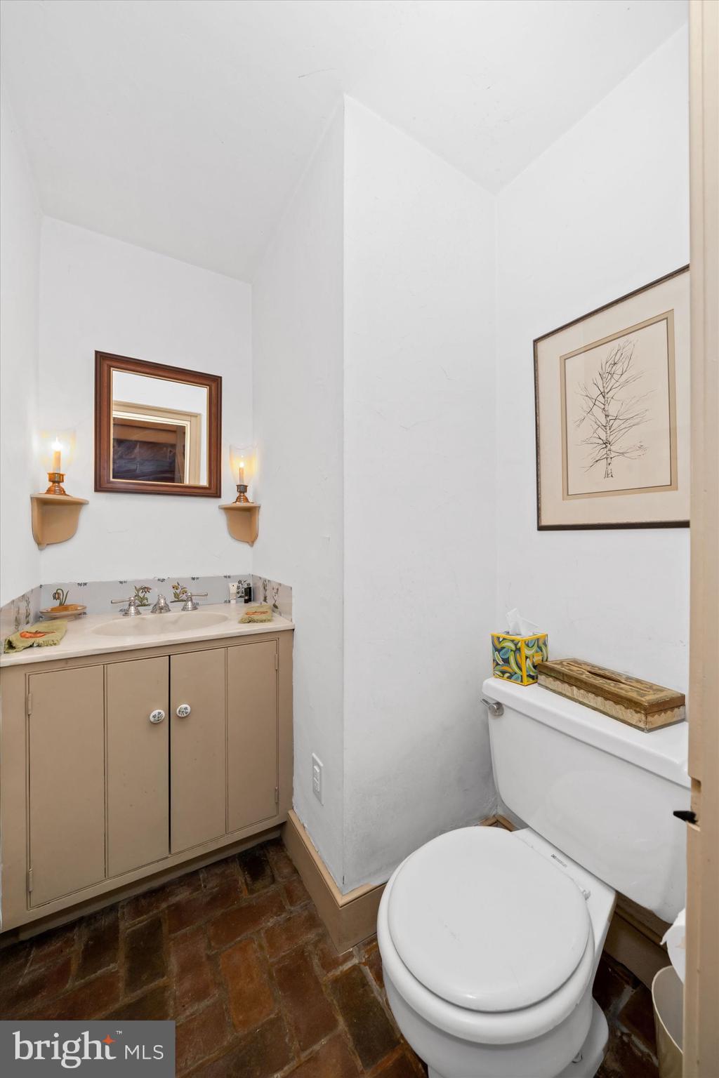975 Brintons Bridge Road West Chester, PA 19382 - Photo 33 of 80 a bathroom with a toilet a sink and mirror