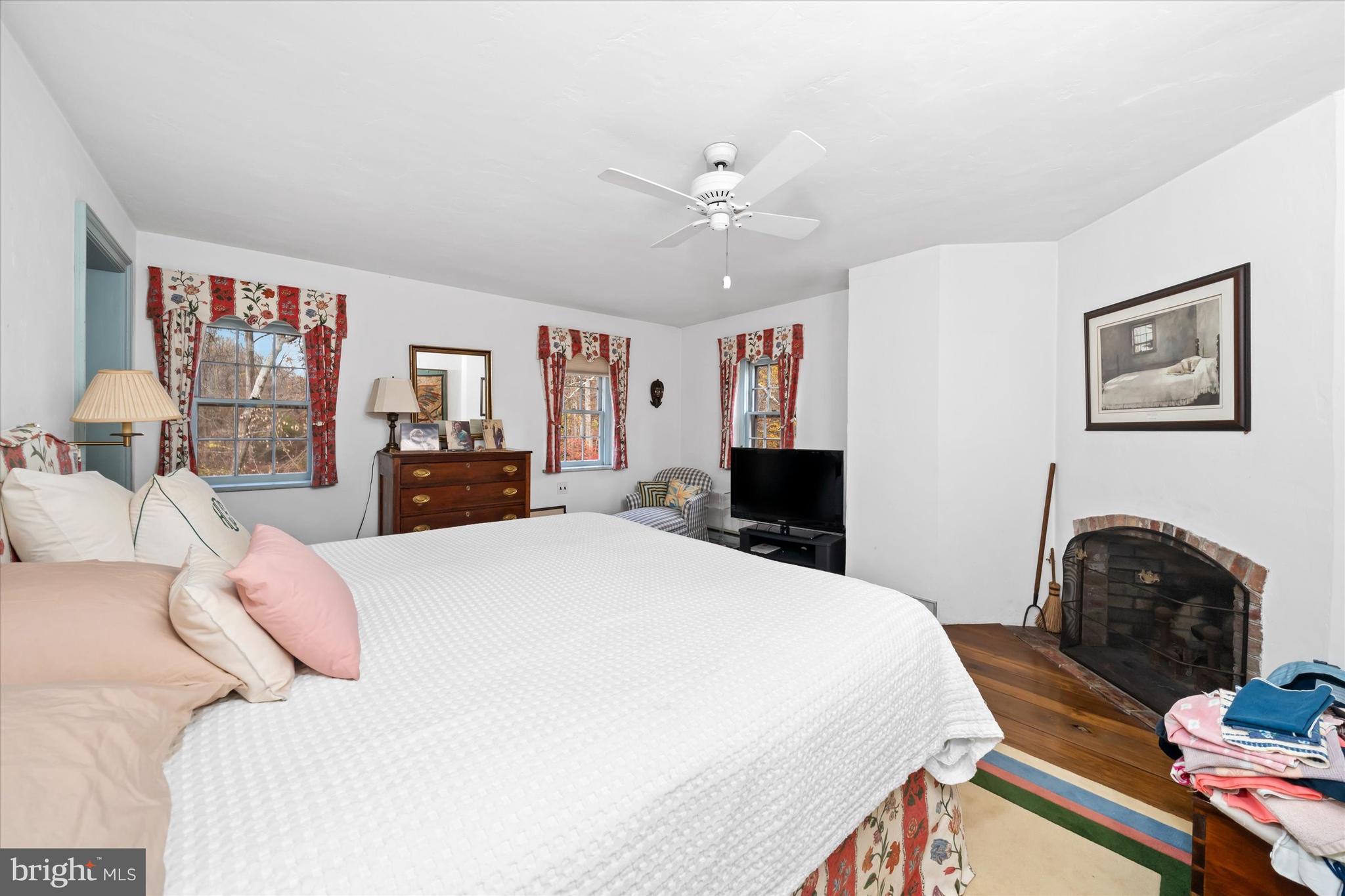 975 Brintons Bridge Road West Chester, PA 19382 - Photo 39 of 80 a bed room with a bed and a television