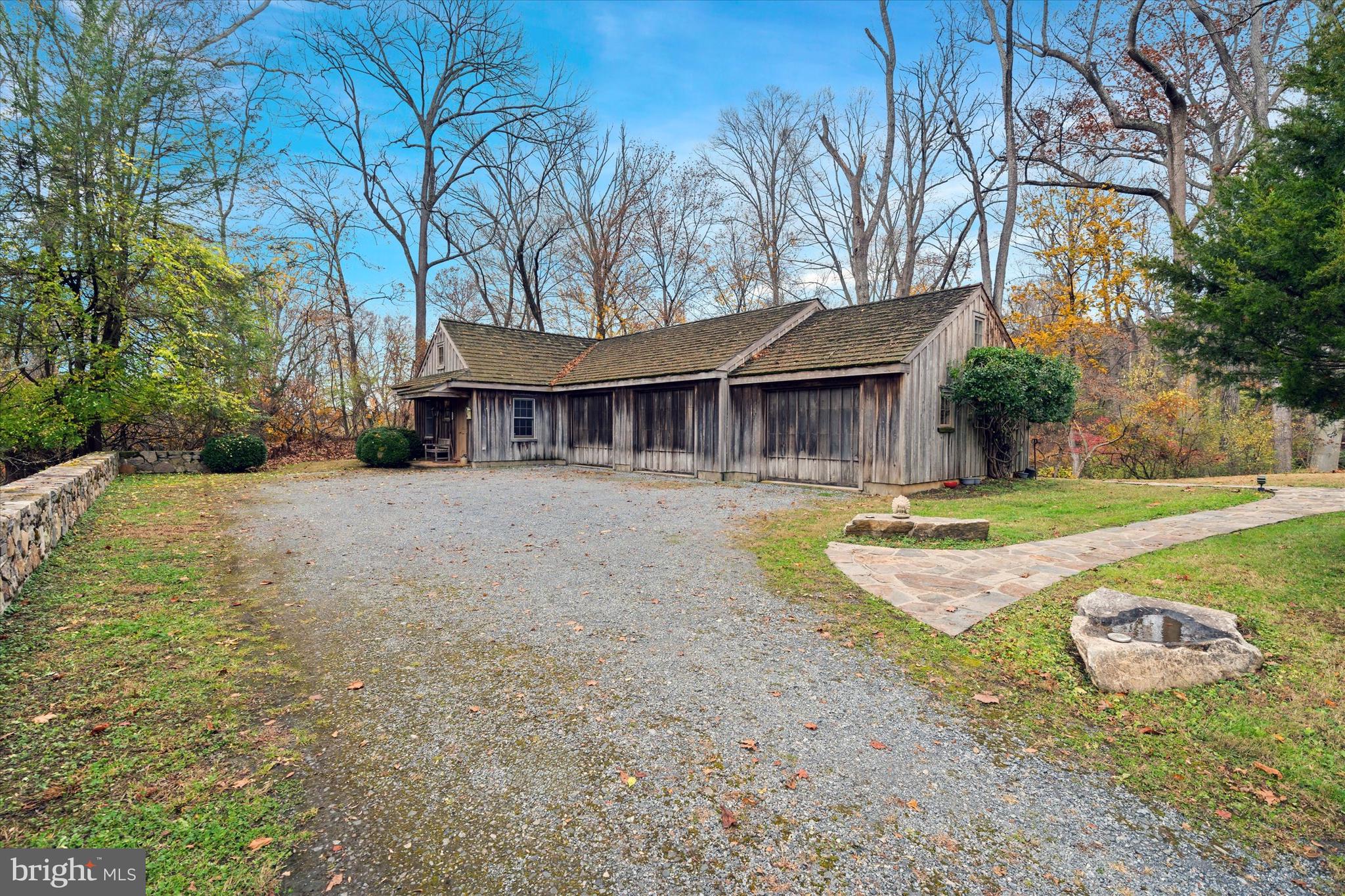 975 Brintons Bridge Road West Chester, PA 19382 - Photo 47 of 80 a view of a house with swimming pool and a yard