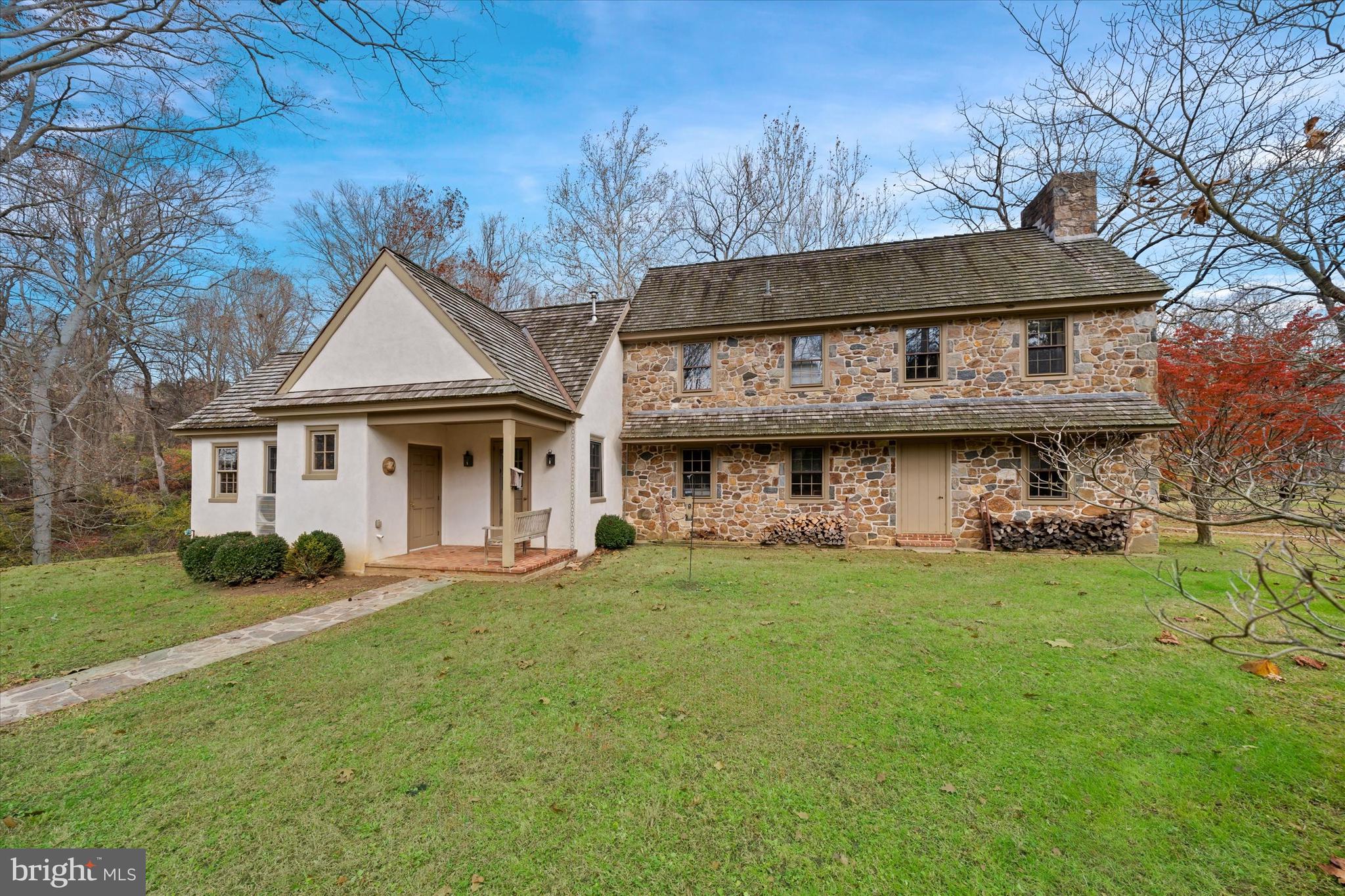 975 Brintons Bridge Road West Chester, PA 19382 - Photo 5 of 80 a view of a big house with a big yard and large trees