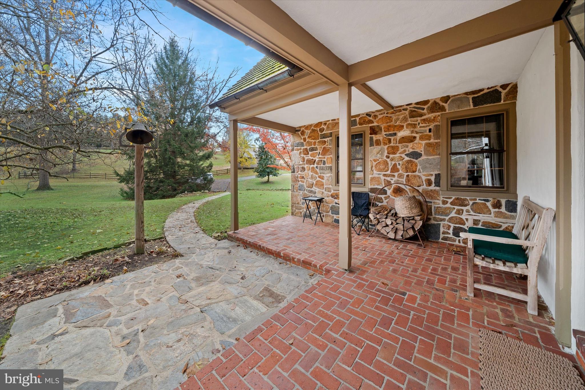 975 Brintons Bridge Road West Chester, PA 19382 - Photo 8 of 80 a view of a backyard with sitting area and porch