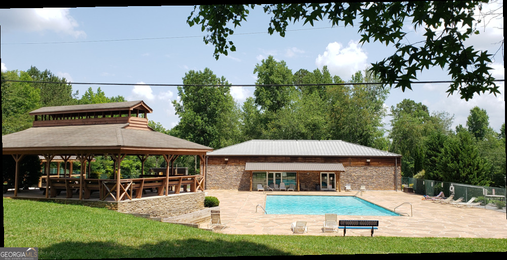 171 B Elk Trail Talking Rock, GA 30175 - Photo 10 of 10 a view of house with garden space and sitting area
