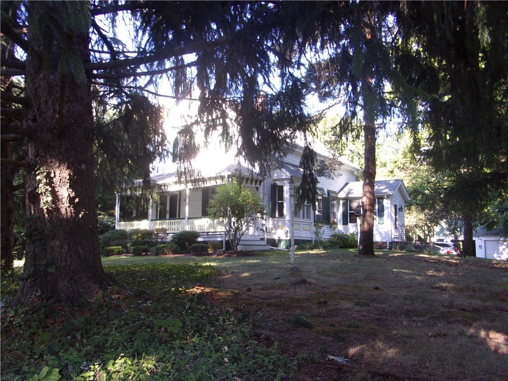 115 Abbott Run Valley Road Cumberland, RI 02864 - Photo 2 of 30 Front and right side of dwelling/View from street.