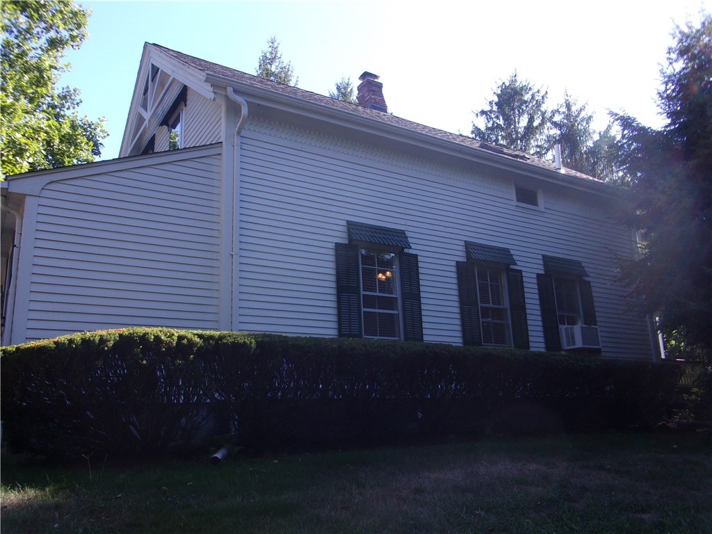 115 Abbott Run Valley Road Cumberland, RI 02864 - Photo 5 of 30 Left side of dwelling.