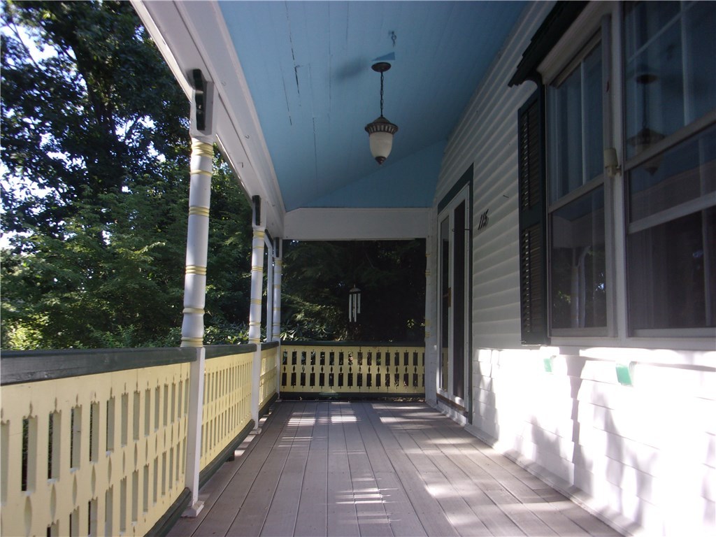 115 Abbott Run Valley Road Cumberland, RI 02864 - Photo 6 of 30 Farmer's Porch/View from right side of dwelling.
