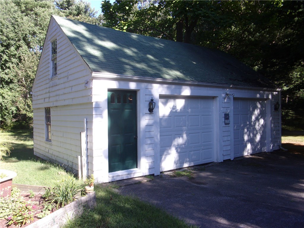 115 Abbott Run Valley Road Cumberland, RI 02864 - Photo 9 of 30 2-Car Garage with additional storage and electricity.