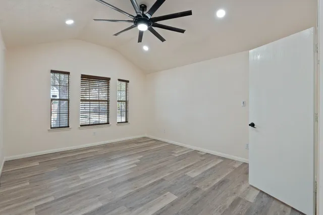 a kitchen with a sink stove and refrigerator