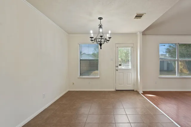 a view of a livingroom with a ceiling fan