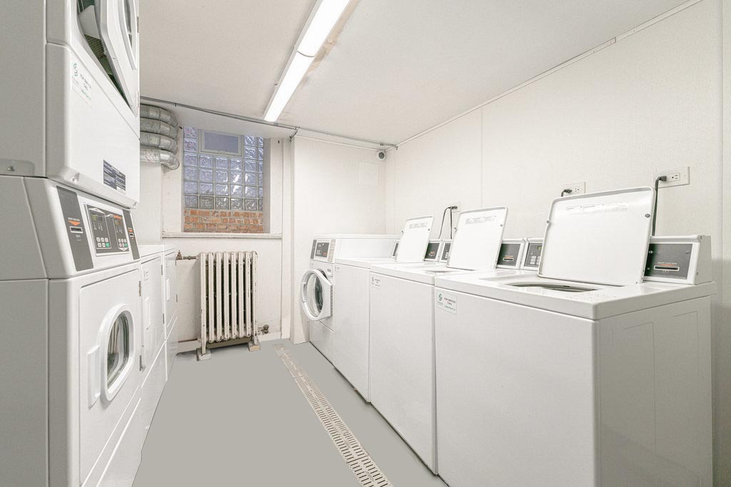 20 East Goethe Street, Unit 104 Chicago, IL 60610 - Photo 16 of 18 a utility room with dryer and washer