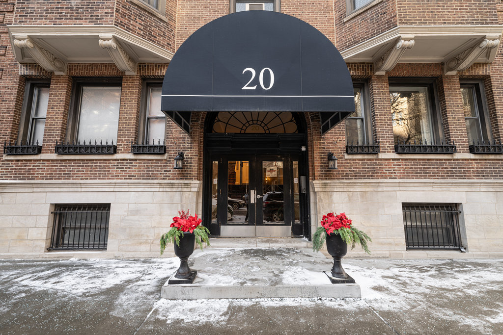 20 East Goethe Street, Unit 104 Chicago, IL 60610 - Photo 2 of 18 a front view of a house with entryway