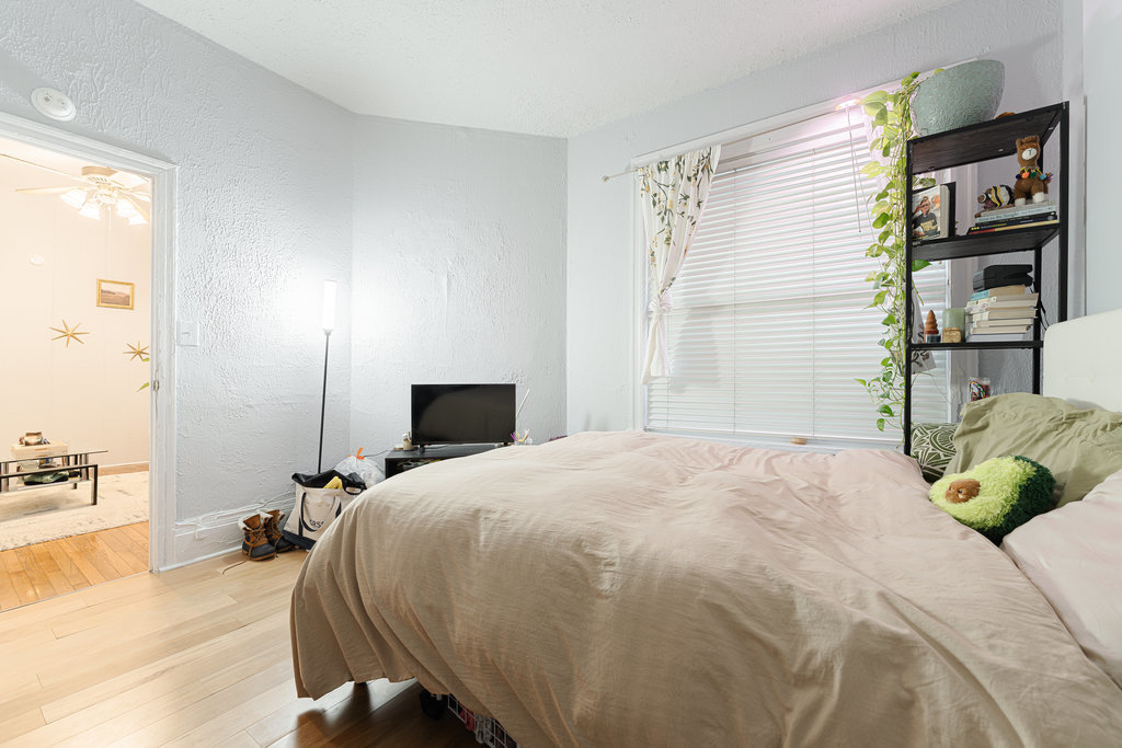 20 East Goethe Street, Unit 104 Chicago, IL 60610 - Photo 8 of 18 a bedroom with a bed and large closet