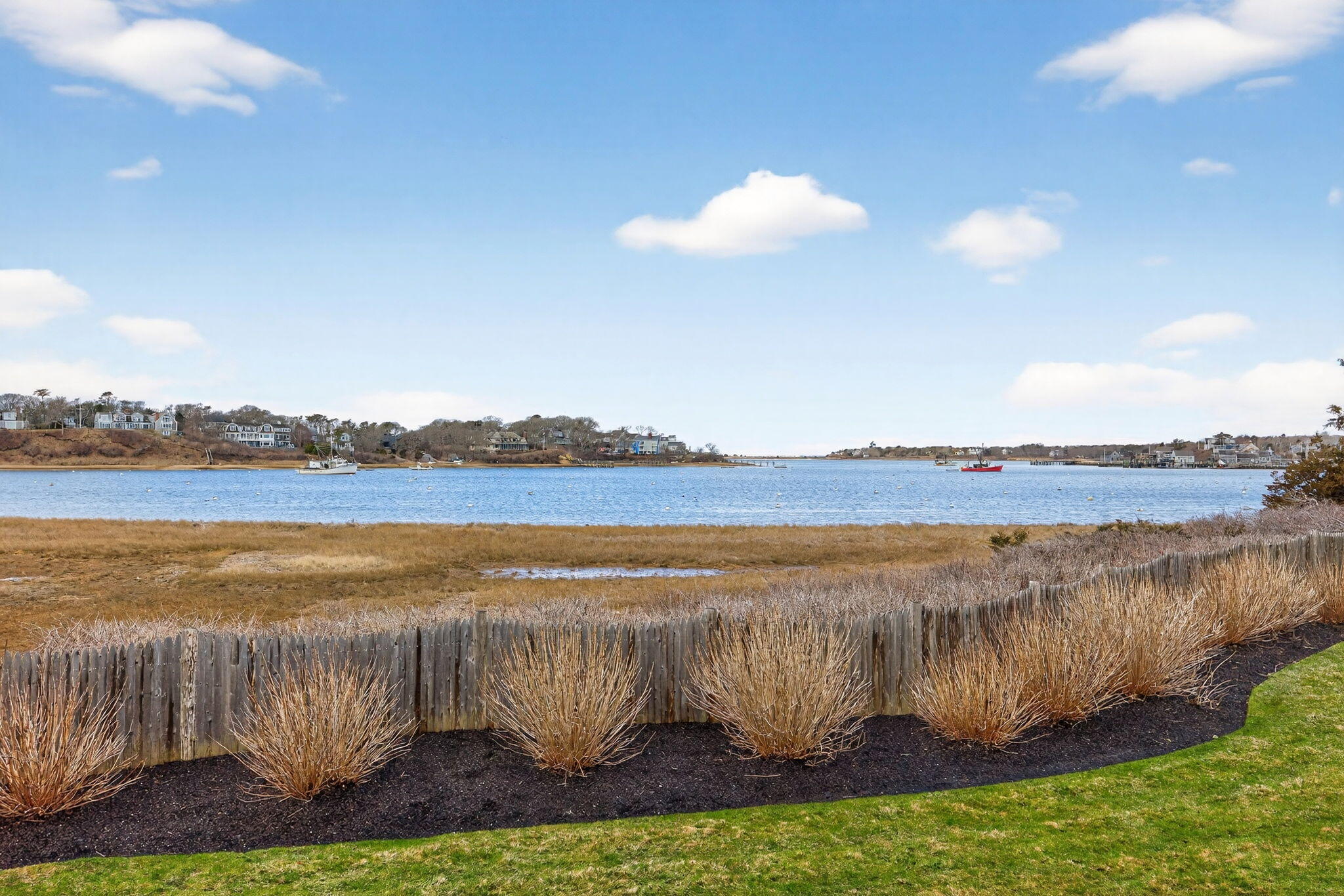 346 Morris Island Road Chatham, MA 02633 - Photo 5 of 33 a view of a lake with a city