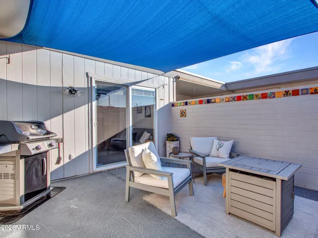 a view of a storage & utility room with cabinets