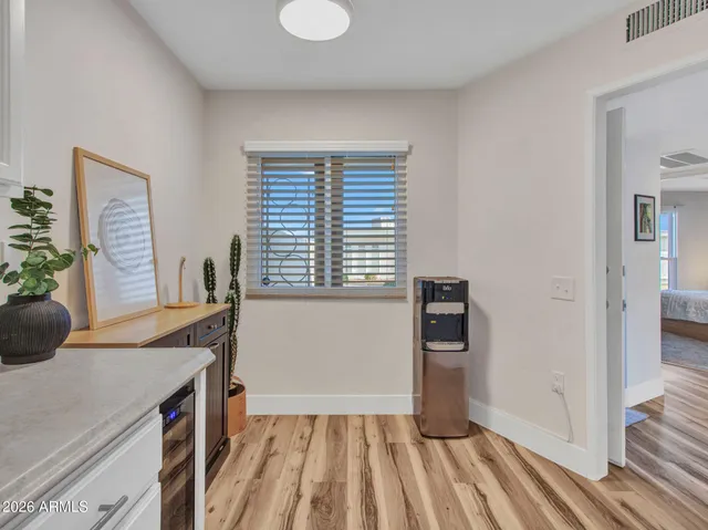 a view of a kitchen from the hallway
