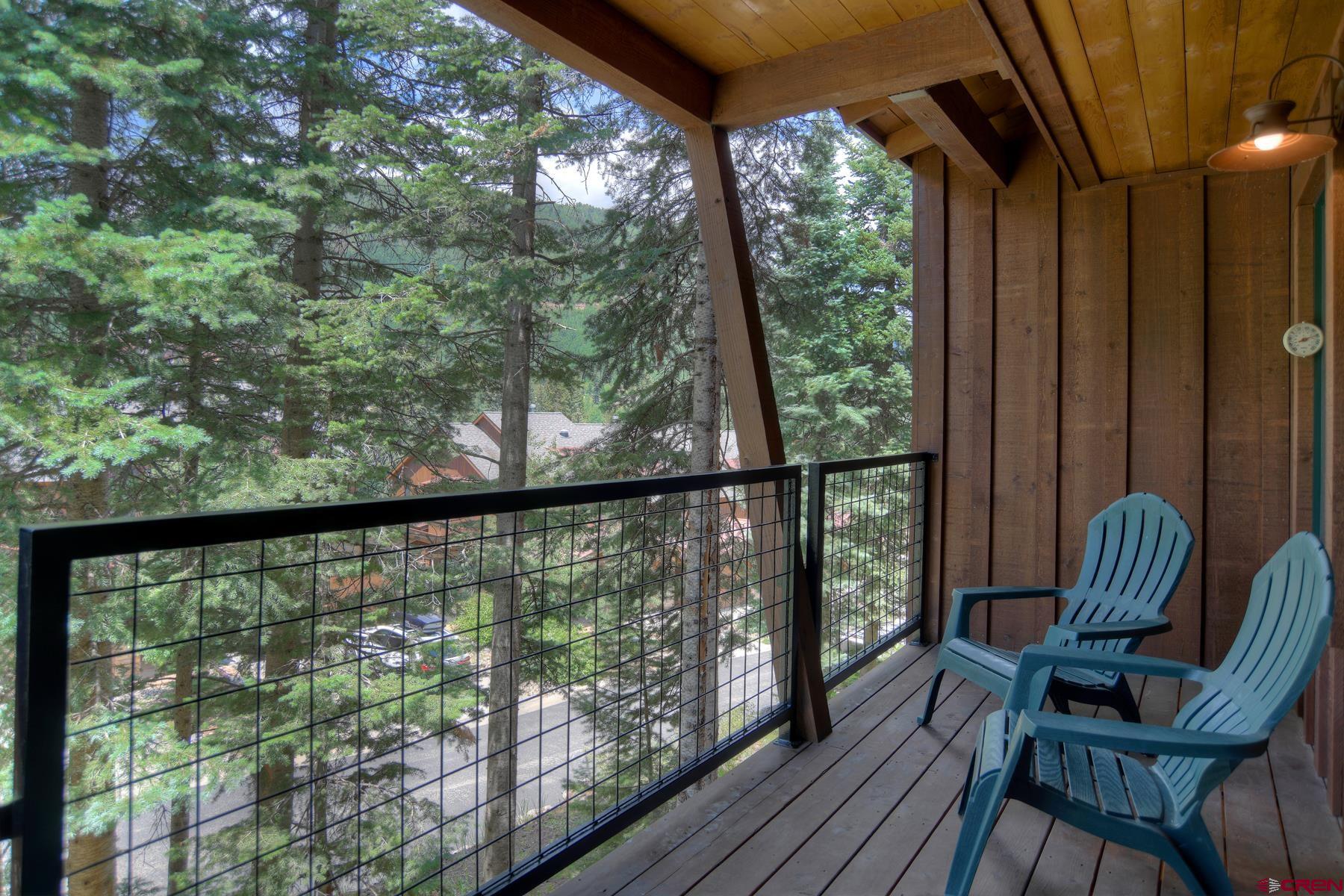 67 Travertine Trail, Unit 67 Durango, CO 81301 - Photo 11 of 35 a view of a two chair in the balcony