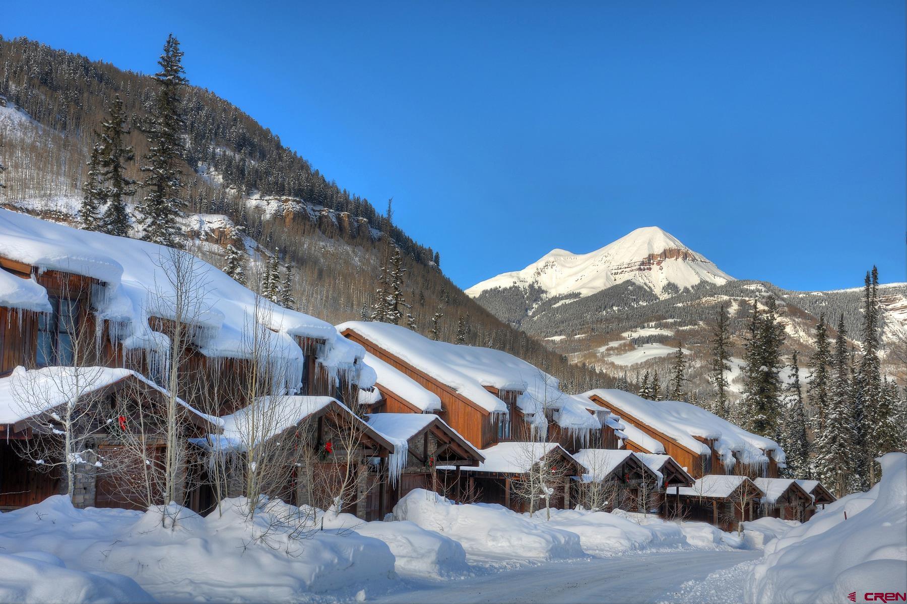 67 Travertine Trail, Unit 67 Durango, CO 81301 - Photo 35 of 35 a view of a house with a snow in the background