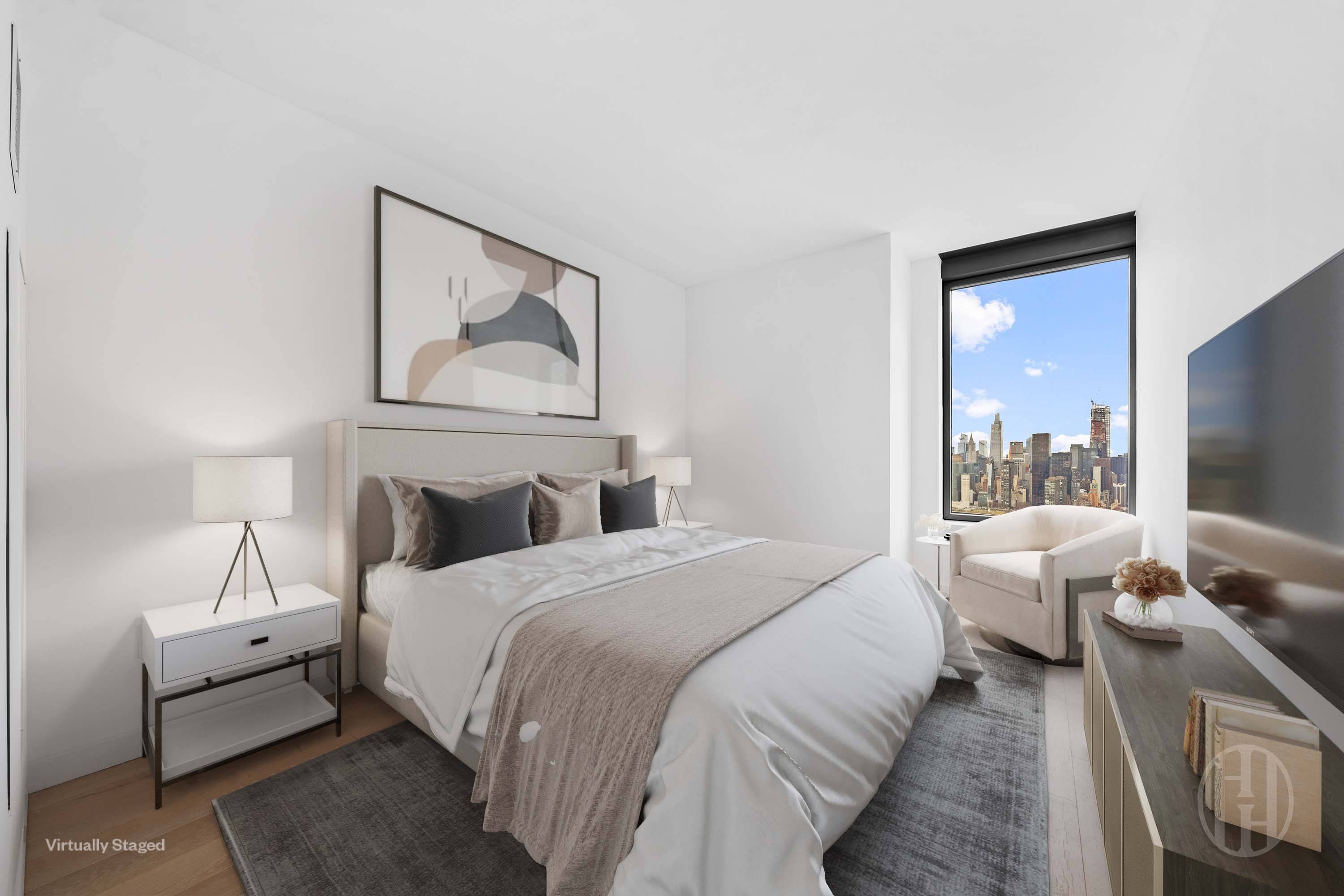 3 Court Square, Unit 5601 Queens, NY 11101 - Photo 11 of 20 a bedroom with bed and a large window